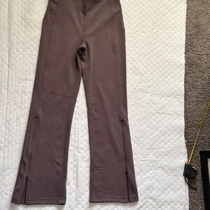 Lululemon Women’s High-Waist Flare Pants in Taupe with zippers at the end of